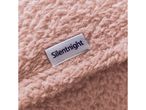 Close-up of a pink fluffy blanket with a white Silentnight brand tag.