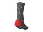Grey sock with a festive candy cane pattern and a red heel
