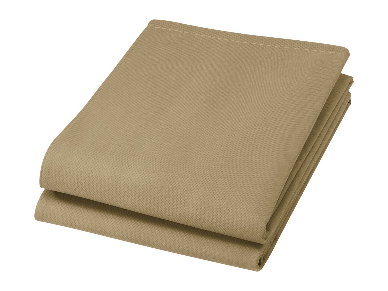Folded tan fabric with a subtle textured pattern