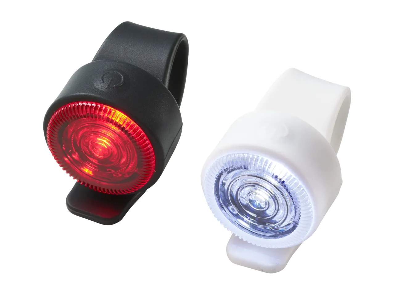 Two bicycle lights, one red and one white, with silicone straps.