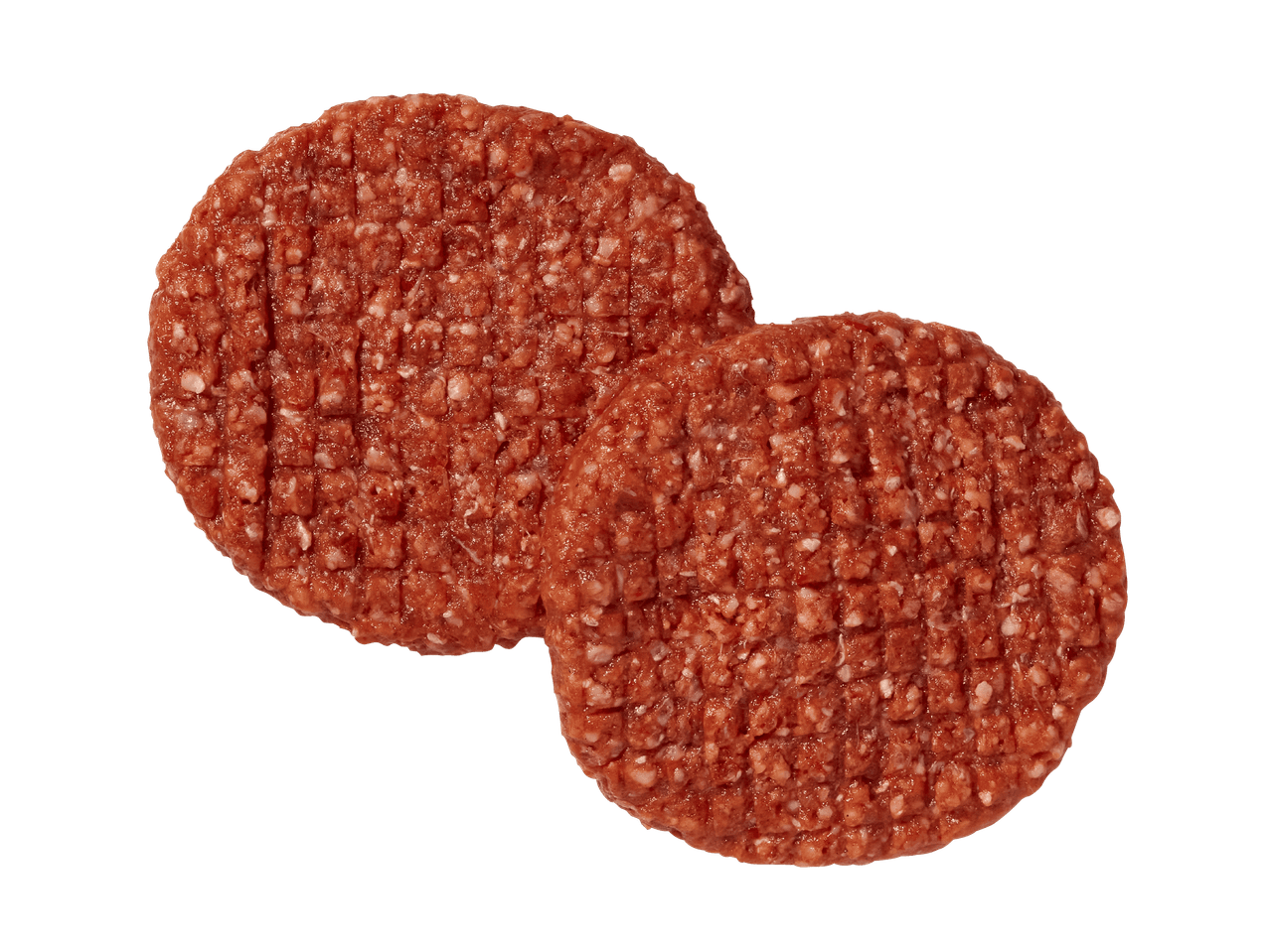 Due polpette di carne macinata crude su sfondo nero.