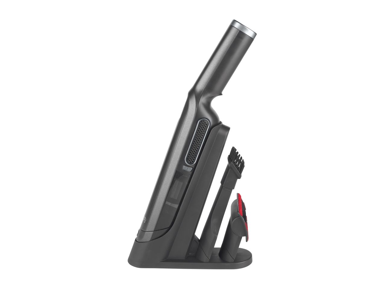 A Dyson cordless vacuum cleaner and its attachments are neatly stored in its docking station.