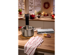 SILVERCREST® Vacuum Sealer and sous vide cooker with food in a festive kitchen.