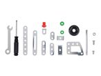 Assorted metal construction toy parts, including tools and fasteners.