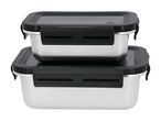 Two stacked stainless steel food containers with black lids and clasps