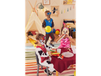 Three children in Paw Patrol costumes playing at a party.