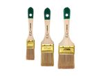 Three Wooster paintbrushes of varying sizes with green handles.