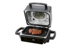 SilverCrest contact grill with grilled steaks.