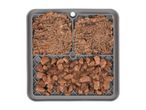 Grey pet food lick mat with two types of wet dog food: pate and chunks in gravy.