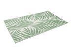 Green and white palm leaf pattern outdoor rug