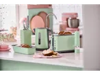 Light green SilverCrest kettle, toaster, and salt grinder on a kitchen counter.