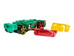 Green toy race car with red and yellow accessories on a white background.