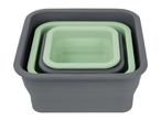 Three nested square silicone containers in gray and light green