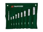 Socket wrench set in a dark green fabric roll-up pouch with various sizes.