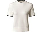 Maglione bianco a maniche corte con bordi neri su collo e maniche.