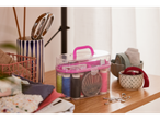 Thread, needles, and sewing supplies in a clear case.
