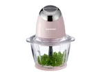 A pink SilverCrest food chopper with parsley in the glass bowl.