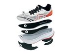 Exploded view of a running shoe showing its five layers: upper, insole, strobel board, midsole, and outsole.
