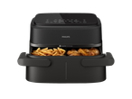 Philips Air Fryer with two baskets, one filled with fries and the other with chicken drumsticks.