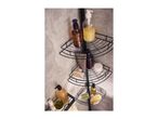 Black corner shower caddy with various bath products, including shampoo, soap, and a brush.