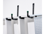 Aluminum ladders and wall hooks for garage organization.