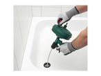 Person using a drain cleaner tool to clear a bathtub drain.