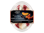 Deluxe mini-ijsdessert: perzik & vanille smaak met frambozensaus (140 ml).