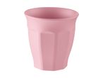 En lyserød krus med en riflet overflade.