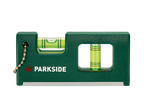 Groene PARKSIDE waterpas met twee libellen en een ketting, op een zwarte achtergrond.