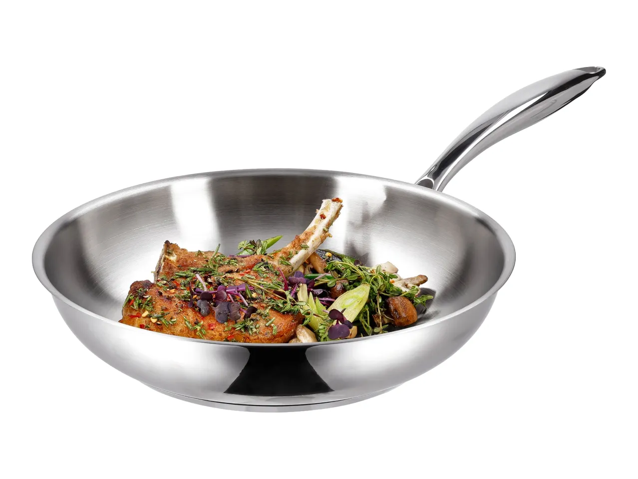 Stainless steel frying pan with cooked lamb chops, mushrooms, and herbs.