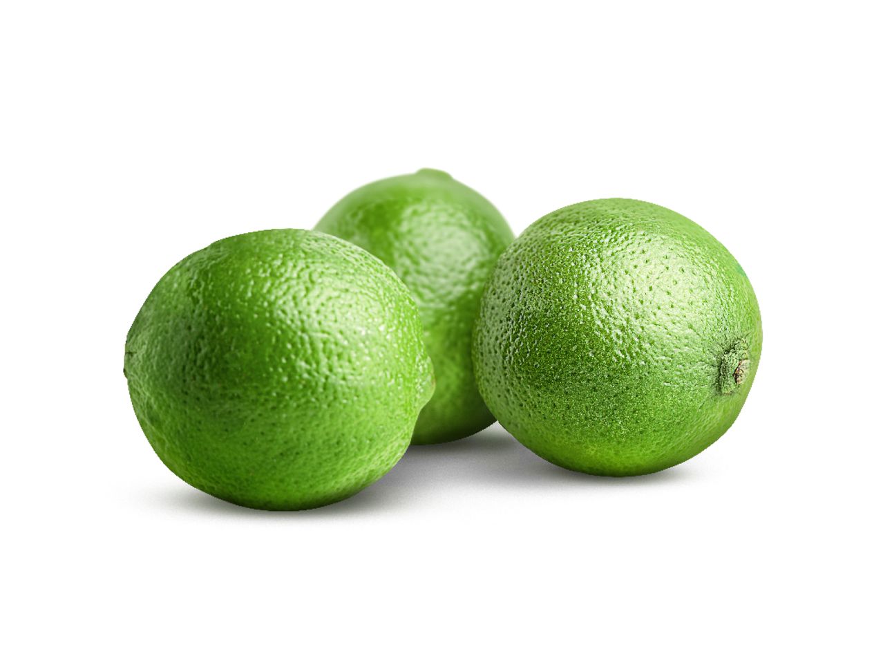 Three bright green limes sit together on a white background.