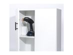 A white cabinet with an open door revealing a garment steamer and a bottle of laundry detergent.