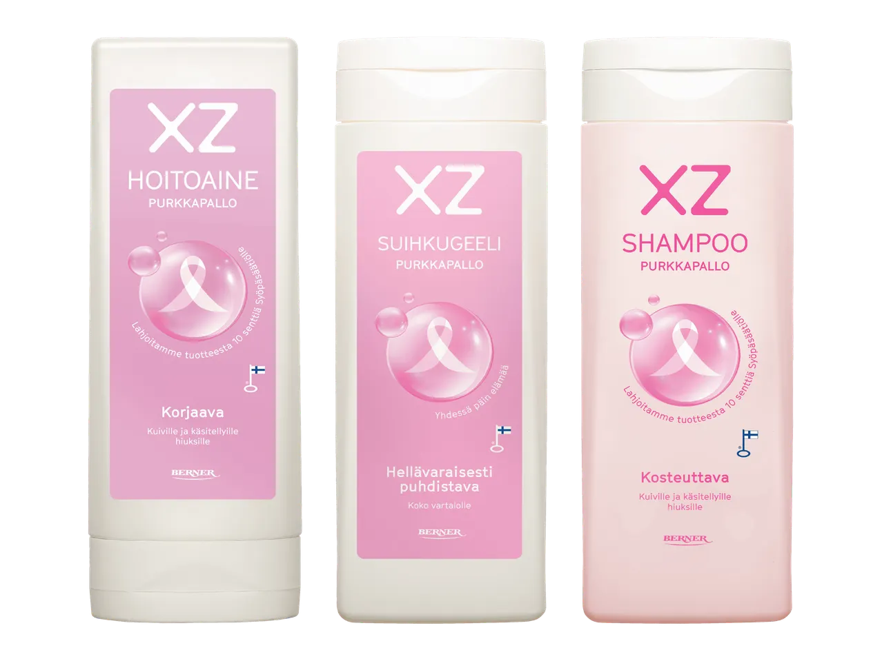 Kolme vaaleanpunaista pulloa, joissa on hoitoaine, suihkugeeli ja shampoo, kaikki purkkapallon tuoksuisia ja tukevat syöpäsäätiötä.
