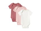 Three baby bodysuits in pink, light pink, and white, short-sleeved.