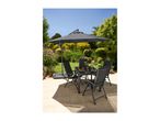 Outdoor dining set with a grey table, four chairs, and a large cantilever umbrella on a patio.