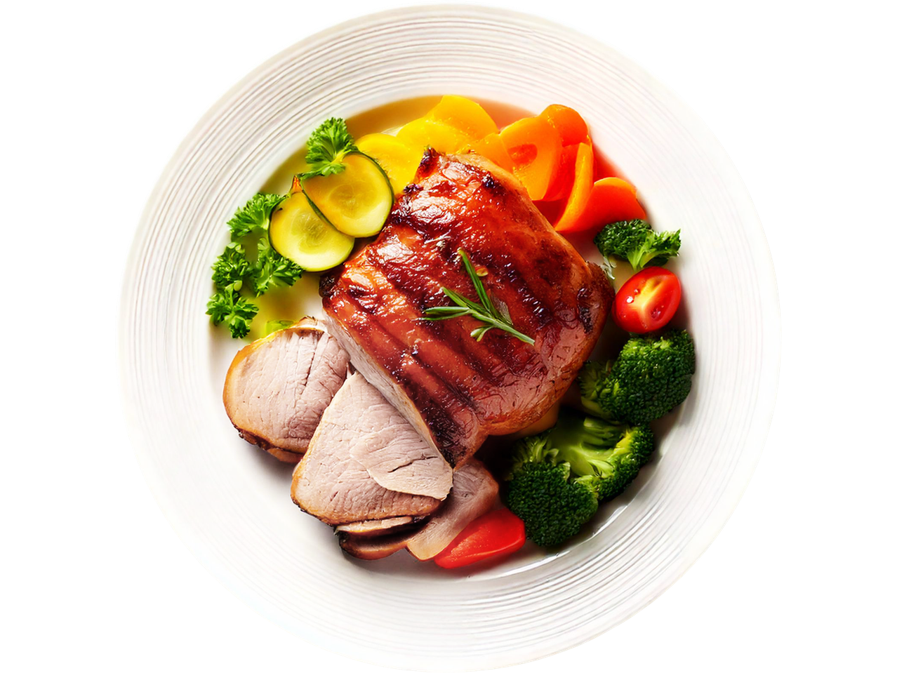 A roasted pork loin with sliced vegetables and herbs on a white plate.