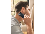 Man trimming his neck hair with a Cien BEAUTY Hair Trimmer.