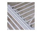 Close-up of a silver clothes drying rack with multiple parallel bars