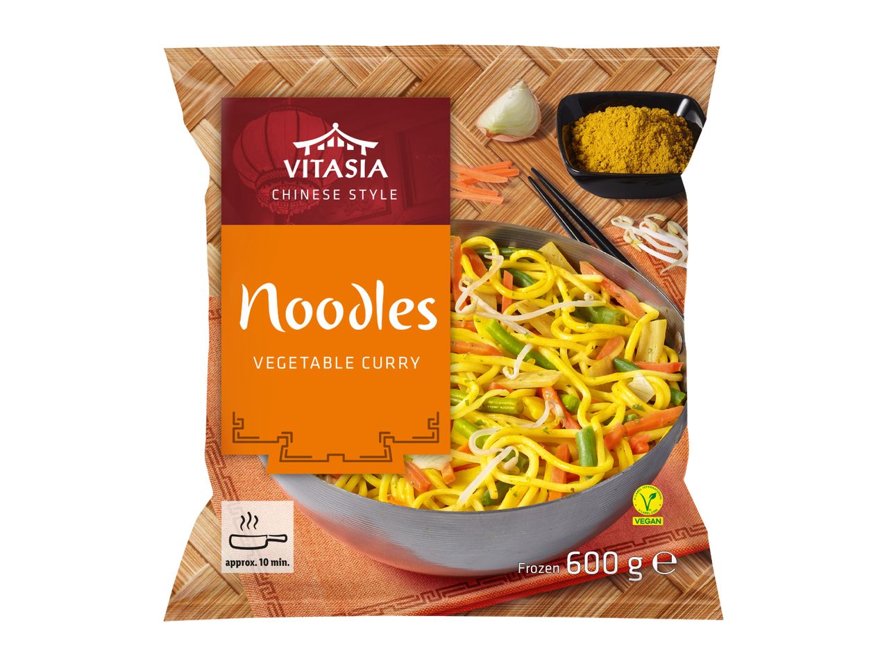 Frozen noodles with vegetable curry, showing cooking time and vegan label, 600g.