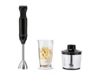 Hand blender set with a mixing beaker containing fruit and a chopper attachment