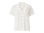 White short-sleeved button-up shirt with a textured fabric and a camp collar.