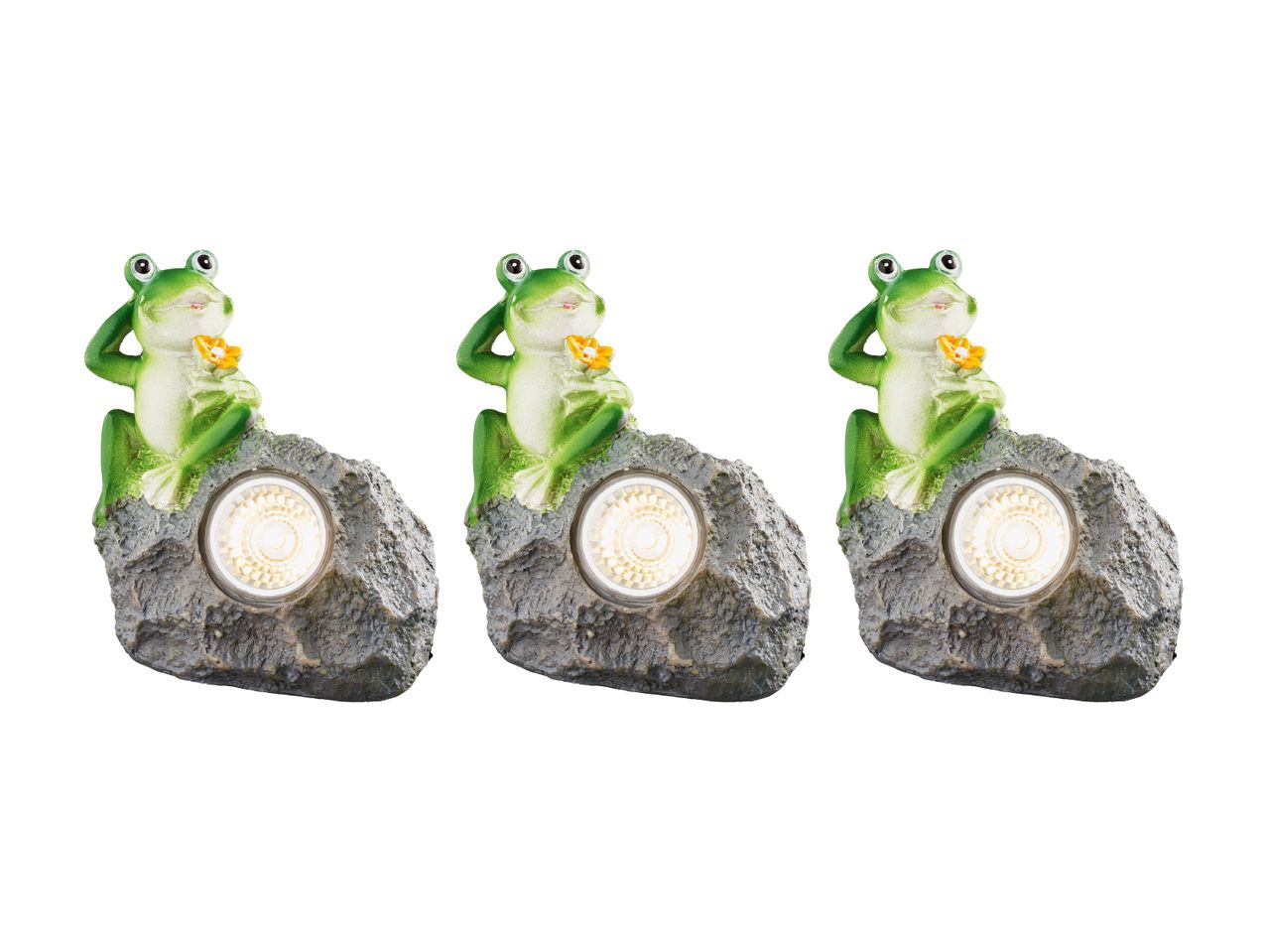 Three frog garden ornaments with solar-powered lights on a white background.