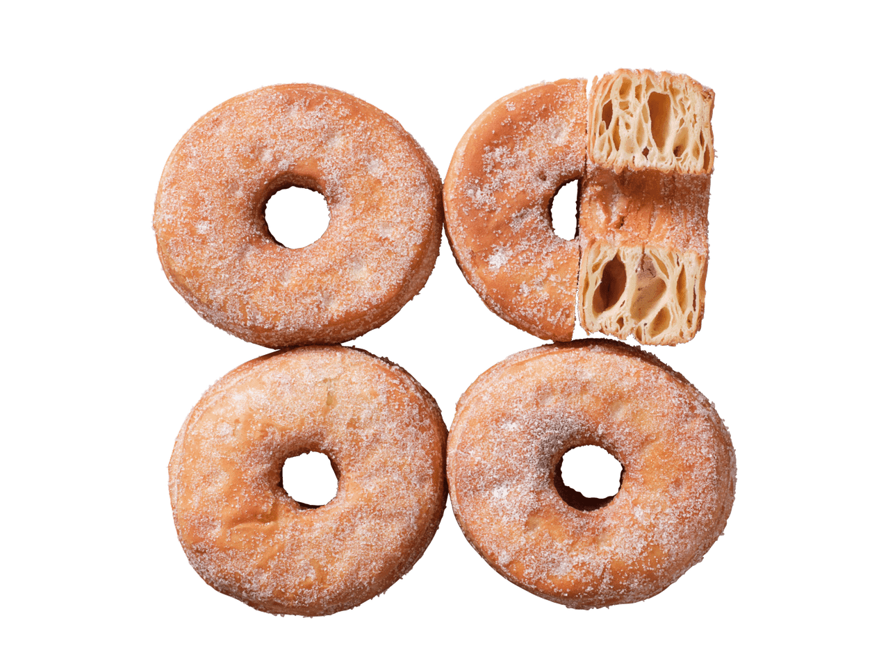 Četras cukurotas virtuļi, viens no tiem pārgriezts uz pusēm, atklājot slāņainu tekstūru.