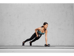 Woman doing a plank with 4kg dumbbells.