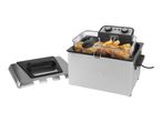 Salter deep fat fryer with a basket full of golden chips and a lid next to it.