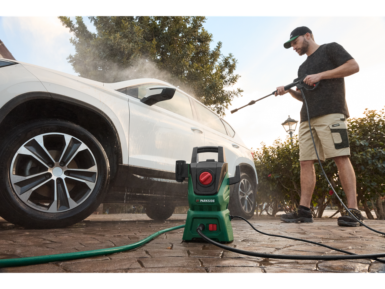 Car washing with Parkside pressure washer.