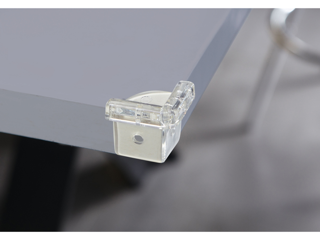 Safety 1st clear corner guard on a gray table