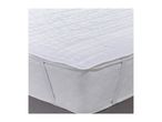 White quilted mattress protector with elastic straps on a bed.