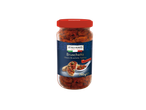 Un pot de bruschetta classique à base de tomates séchées, avec une portion sur du pain grillé.