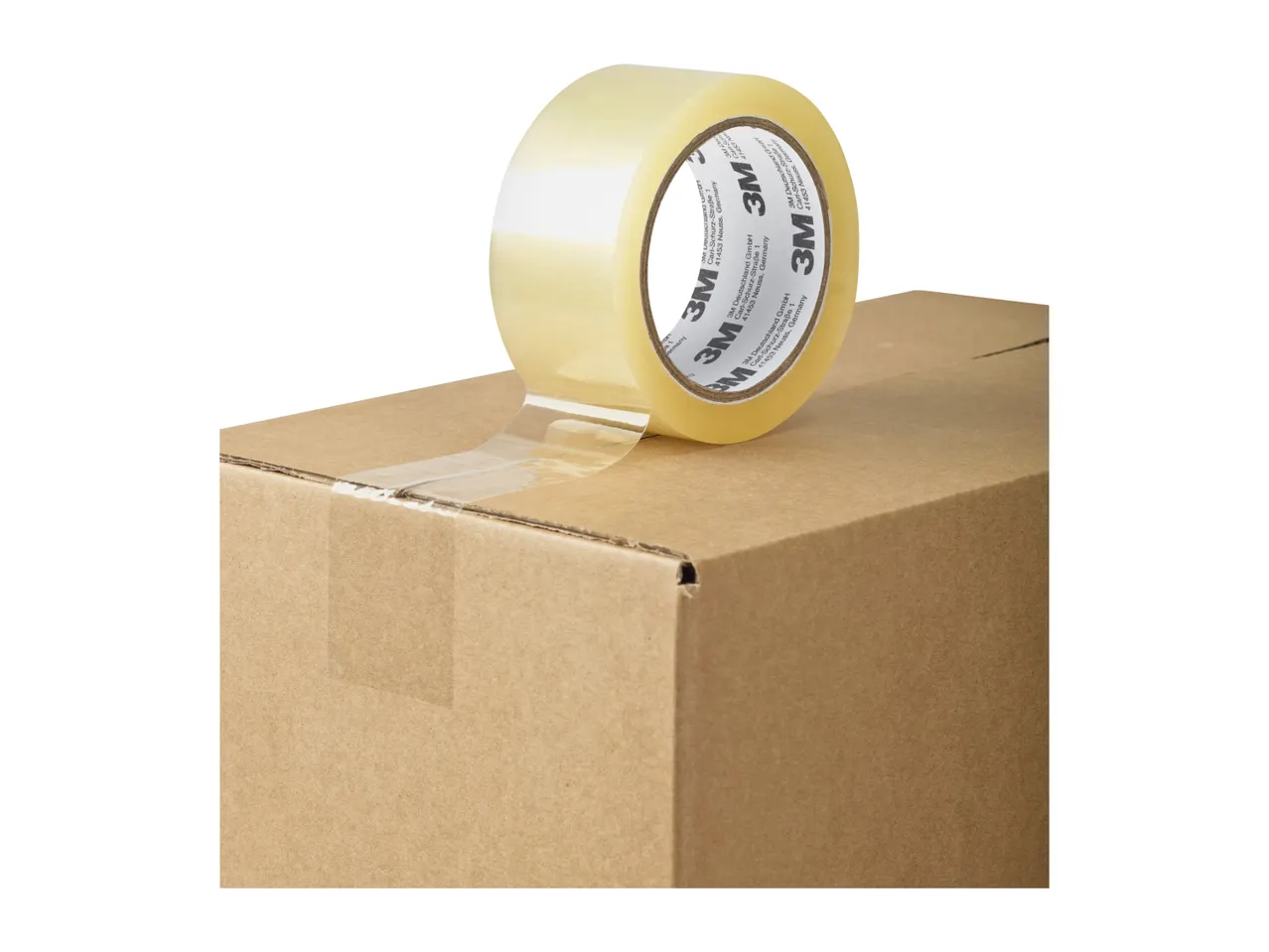 Clear packing tape on a cardboard box, with text on the tape indicating it's from Germany.